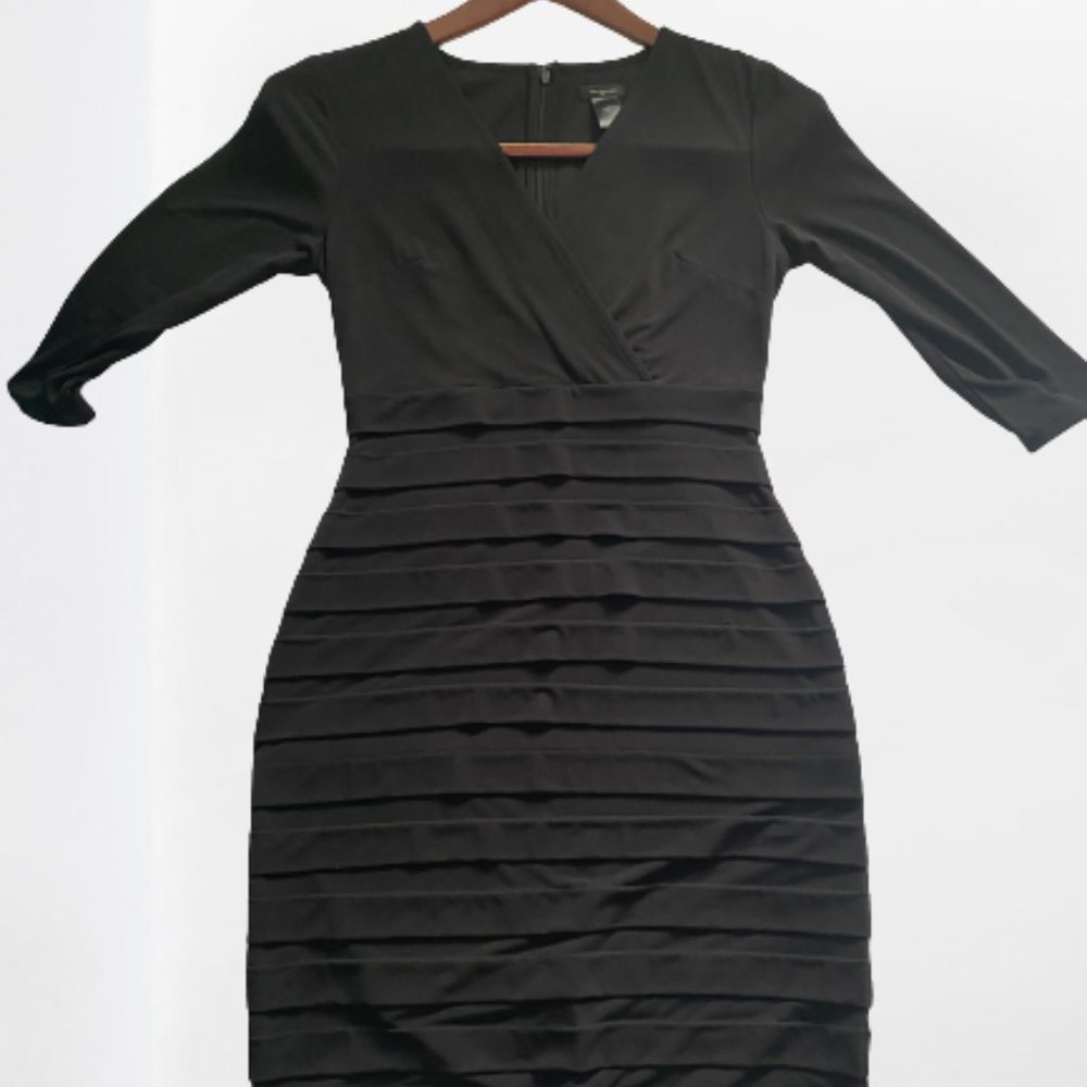 Ann Taylor Black dress never been worn.